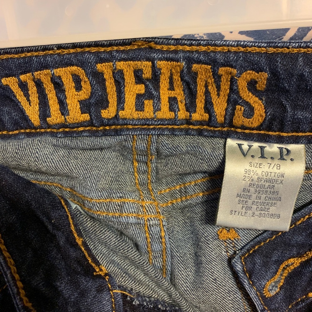 Distressed blue jeans